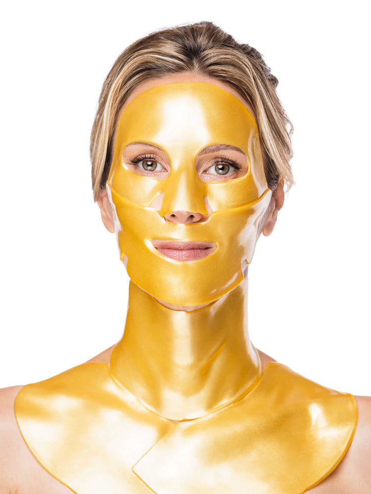 Woman wearing a gold face mask on a white background