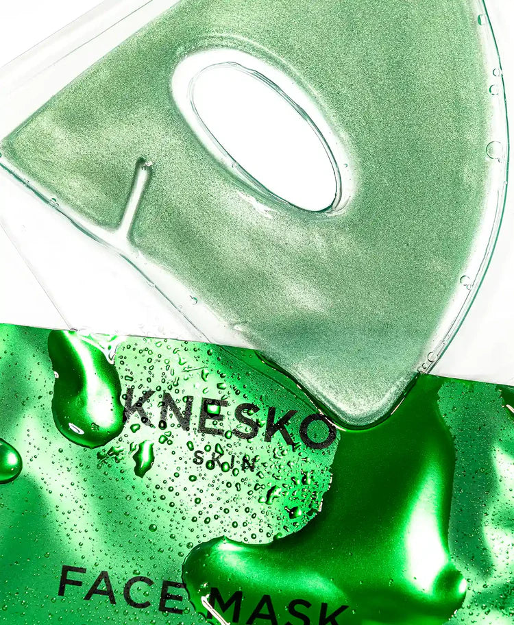 Green face mask packaging with 'Knesko' branding on a white background